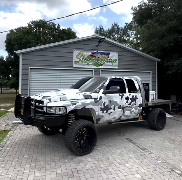 Vehicle wrap installation background showing professional wrap process