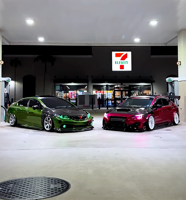 Honda and Subaru Custom Vehicle Wraps Honda and Subaru parked side by side with custom vinyl wraps by Slap A Wrap